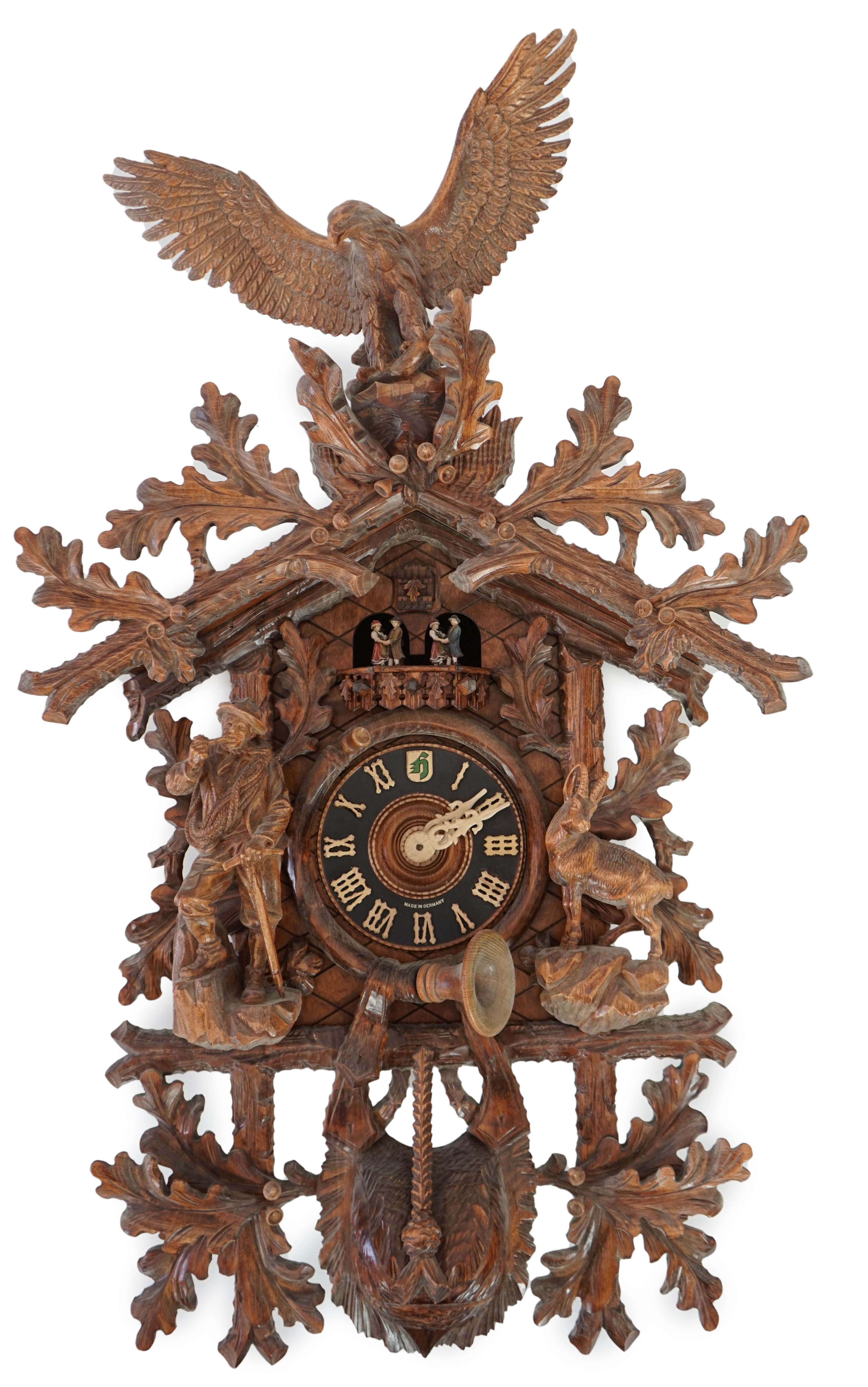 A Hönes Black Forest carved wood cuckoo clock